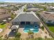 Aerial view of backyard featuring a large pool, spa, gazebo, playground, and patio at 42161 N Via Cienna --, San Tan Valley, AZ 85140