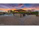 Outdoor kitchen, pool, and playset offer endless entertainment possibilities in this backyard at 42161 N Via Cienna --, San Tan Valley, AZ 85140