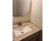Bathroom featuring sink and vanity with chrome fixtures and gold-trimmed mirror at 4533 N 17Th Ave, Phoenix, AZ 85015