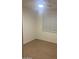 Clean bedroom interior with a window and wood-look vinyl flooring at 4533 N 17Th Ave, Phoenix, AZ 85015