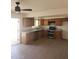 Bright kitchen featuring stainless appliances, light countertops, and wood-look flooring at 4533 N 17Th Ave, Phoenix, AZ 85015