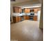 Spacious kitchen featuring stainless appliances, light countertops, and wood-look flooring at 4533 N 17Th Ave, Phoenix, AZ 85015