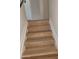 Interior staircase with wood steps and white risers and stringers at 4533 N 17Th Ave, Phoenix, AZ 85015