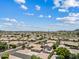 Expansive aerial showing the neighborhood with scenic mountain views at 4701 W Fallen Leaf Ln, Glendale, AZ 85310