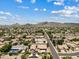 Expansive aerial of community featuring scenic views of the landscape and mountains at 4701 W Fallen Leaf Ln, Glendale, AZ 85310