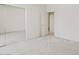 Spacious bedroom with a large closet and carpet flooring at 4701 W Fallen Leaf Ln, Glendale, AZ 85310