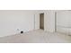 Neutral bedroom featuring large closets and carpet flooring at 4701 W Fallen Leaf Ln, Glendale, AZ 85310