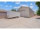 Detached garage and side yard featuring a trailer and additional parking space at 4701 W Fallen Leaf Ln, Glendale, AZ 85310
