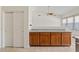 Charming kitchen area with wood cabinets and granite countertops at 4701 W Fallen Leaf Ln, Glendale, AZ 85310
