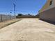 Spacious backyard featuring a concrete patio and block fencing at 4911 W Merrell St, Phoenix, AZ 85031