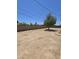 Large backyard featuring a mature shade tree at 4911 W Merrell St, Phoenix, AZ 85031