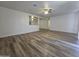 Bright living area with open layout, wood flooring, and neutral color palette at 4911 W Merrell St, Phoenix, AZ 85031