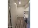 A storage room with shelves and a laminate floor, ready for organizing essentials at 4911 W Merrell St, Phoenix, AZ 85031