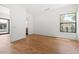 Bright room featuring hardwood floors and a view of the desert landscape at 5301 N 43Rd St, Phoenix, AZ 85018