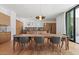 Dining area adjacent to open concept kitchen and access to outdoor living at 5301 N 43Rd St, Phoenix, AZ 85018