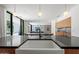 Modern kitchen features a farmhouse sink, pendant lighting, and seamless flow into the dining and living area at 5301 N 43Rd St, Phoenix, AZ 85018