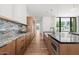 Modern kitchen with gas range and island at 5301 N 43Rd St, Phoenix, AZ 85018
