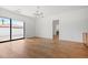 Modern living room featuring hardwood floors, minimalist design, and seamless access to outdoor views at 5301 N 43Rd St, Phoenix, AZ 85018