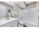 Bright bathroom features a shower-tub combo and modern vanity sink at 616 S Hardy Dr # 203, Tempe, AZ 85281