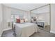 Cozy bedroom with a plush bed, neutral colors, and mirrored closet at 616 S Hardy Dr # 203, Tempe, AZ 85281