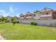Well-maintained apartment complex with a green lawn at 616 S Hardy Dr # 203, Tempe, AZ 85281