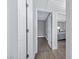 Hallway with open doors leading to bedrooms and other rooms at 616 S Hardy Dr # 203, Tempe, AZ 85281