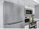 Modern kitchen with stainless steel appliances and stylish countertops at 616 S Hardy Dr # 203, Tempe, AZ 85281