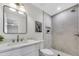 Modern bathroom featuring a stylish vanity with framed mirror and updated shower at 6415 S Newberry Rd # A, Tempe, AZ 85283