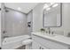 Nicely remodeled bathroom featuring a stylish vanity with framed mirror and updated shower at 6415 S Newberry Rd # A, Tempe, AZ 85283