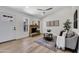 Inviting living room featuring a brick fireplace, a comfortable couch, and ample natural light at 6415 S Newberry Rd # A, Tempe, AZ 85283