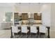 Gourmet kitchen with granite countertops and a large center island, ideal for culinary enthusiasts at 6450 E Monterra Way, Scottsdale, AZ 85266