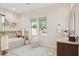 Relaxing main bathroom featuring a soaking tub, ample natural light, and neutral tones at 6450 E Monterra Way, Scottsdale, AZ 85266
