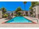 Beautiful community pool with lounge chairs and lush landscaping at 740 W Elm St # 266, Phoenix, AZ 85013
