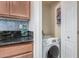 Convenient laundry area with front-load washer and dryer at 740 W Elm St # 266, Phoenix, AZ 85013