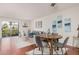 Living and dining area combination with wood floors, open floor plan, and a balcony view at 740 W Elm St # 266, Phoenix, AZ 85013