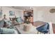 Charming living room with wood floors and seamless access to the kitchen area at 740 W Elm St # 266, Phoenix, AZ 85013