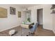 Office space with floating shelves and a cozy chair and rug at 740 W Elm St # 266, Phoenix, AZ 85013