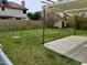 A large backyard with a concrete patio and large grass yard at 7537 W Dreyfus Dr, Peoria, AZ 85381