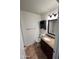 Well-maintained bathroom featuring granite countertops, dark wood cabinets, and tile flooring at 8254 E Posada Ave, Mesa, AZ 85212