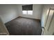 Cozy bedroom filled with natural light, complimented by clean walls and plush carpeted floors at 8254 E Posada Ave, Mesa, AZ 85212