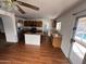 Kitchen featuring wood cabinets, granite counters, and stainless steel appliances at 8254 E Posada Ave, Mesa, AZ 85212