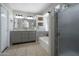 Well-lit bathroom boasts double sinks, soaking tub, and a separate shower at 839 W Silver Creek Rd, Gilbert, AZ 85233
