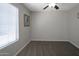 Neutral bedroom with ceiling fan, natural light, and plush carpeting at 839 W Silver Creek Rd, Gilbert, AZ 85233