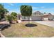 Inviting single-story home with manicured lawn and a spacious driveway at 839 W Silver Creek Rd, Gilbert, AZ 85233