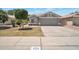 Charming single-story home with manicured lawn and inviting curb appeal at 839 W Silver Creek Rd, Gilbert, AZ 85233