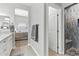 Bathroom featuring double sinks, granite counters, and a glass-enclosed shower at 8785 E Greenview Dr, Gold Canyon, AZ 85118