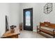 Inviting foyer showcasing a decorative front door and warm, neutral finishes at 8785 E Greenview Dr, Gold Canyon, AZ 85118