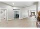 Hallway showcasing new tile floors and modern trim throughout at 8785 E Greenview Dr, Gold Canyon, AZ 85118