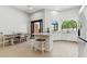 Bright and airy kitchen features a breakfast bar, stainless steel appliances, and a view of the backyard through arched windows at 8785 E Greenview Dr, Gold Canyon, AZ 85118