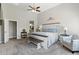 Comfortable main bedroom with soft carpet, and a seating area at 8785 E Greenview Dr, Gold Canyon, AZ 85118